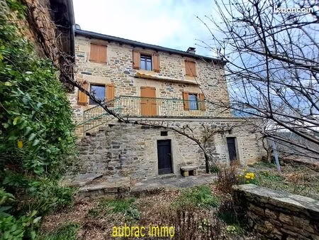 belle maison en pierres t4 rénovée avec dépendances garage chaufferie a pellets et terrain