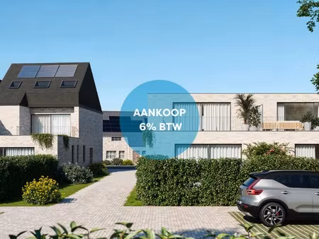 gelijkvloers appartement met drie slaapkamers en tuin