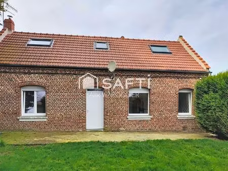 maison en briques avec jardin  au coeur du village