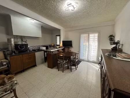 maison de village trois faces avec garage