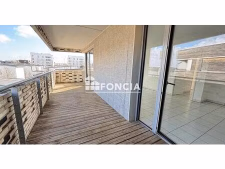 t3 andromede avec terrasse et 2 parkings sous-sol