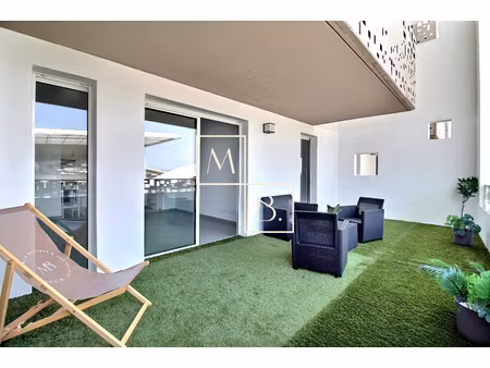 ovalie   t2 48 m2 avec terrasse de 25 m2 et parking