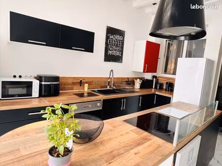 maison de ville composée de 2 appartements