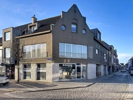 opbrengsteigendom bestaande uit 3 appartementen + handelsgelijkvloers gelegen in het centr