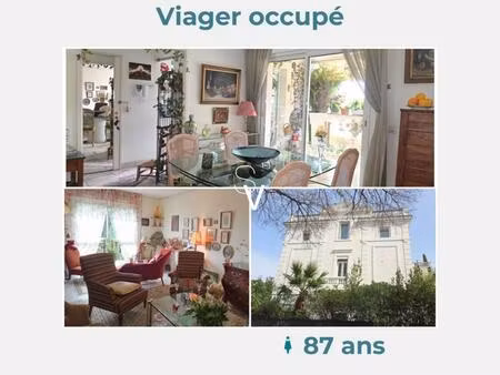 viager occupé - appartement t4 de 105 m2 avec terrasse  parking - madame 87 ans