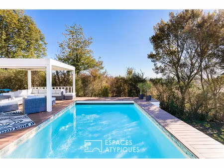 maison familiale avec piscine et vue dégagée à sainte-foy-d'aigrefeuille
