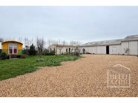 ensemble immobilier comprenant un hangar de 180 m2 + maison
