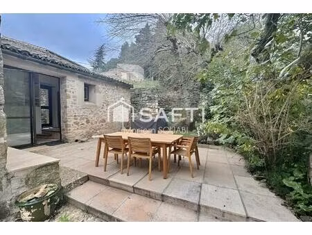 maison de caractère 220m2  jardin  terrasse  places de parking privatives