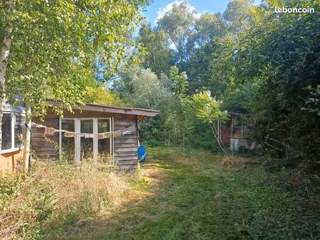 terrain de loisirs avec accès rivière