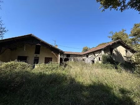 ferme en pierre a renover et son terrain de 6 hectares