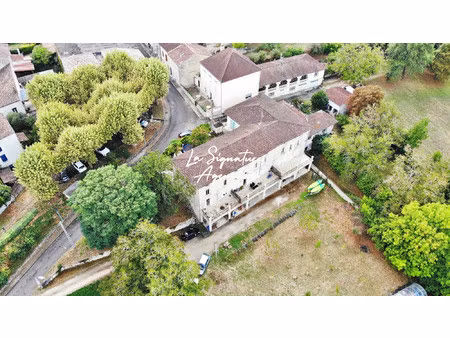 ensemble immobilier de 953 m2 avec parc arboré de 6598 m2 au bo