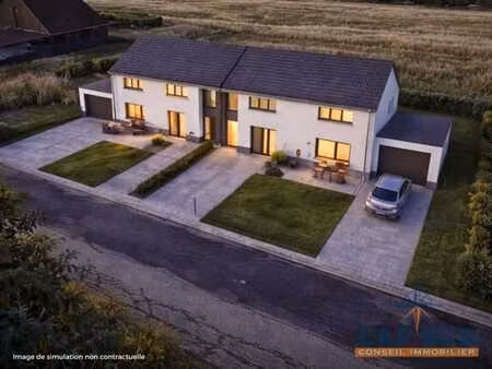 projet immobilier octroyé : 2 maisons 3 façades à hanzinelle