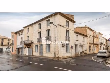 un immeuble de rapport composé de deux appartements t3  un garage et un local