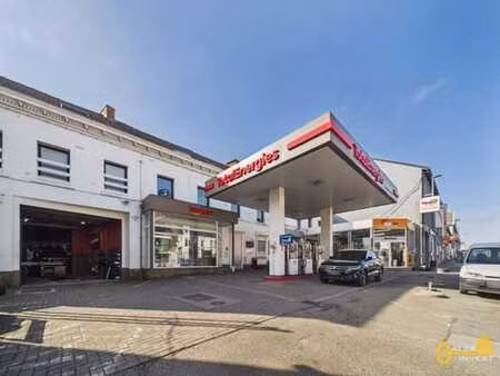 station-service  shop  atelier  showroom + 4 appartements