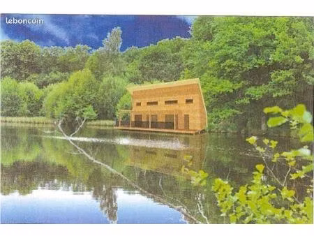 etang avec possibilité de construction gîtes de pêche  villa sur pilotis  et cabane dans l