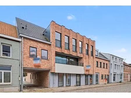 afgewerkt nieuwbouwappartement met 1 slaapkamer en garage (67m²)