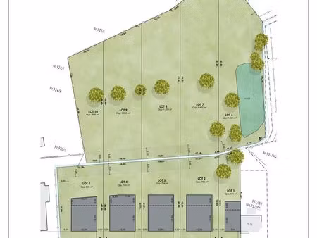 drie vergunde bouwgronden te koop