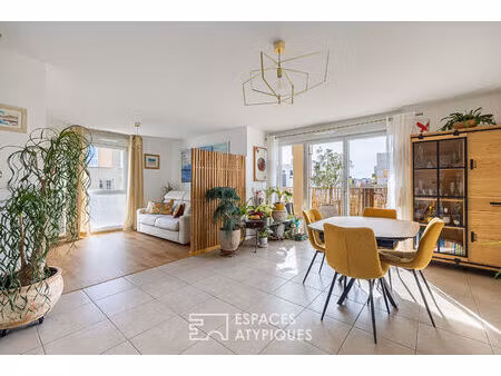 appartement avec terrasse au dernier étage dans un immeuble contemporain