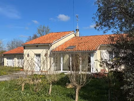 a sainte-livrade avec terrain   véranda et double garage