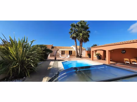 maison 4 chambres avec piscine chauffée et garage ? proche marché