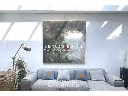 loft baigné de lumière dans un ancien atelier en coeur de ville