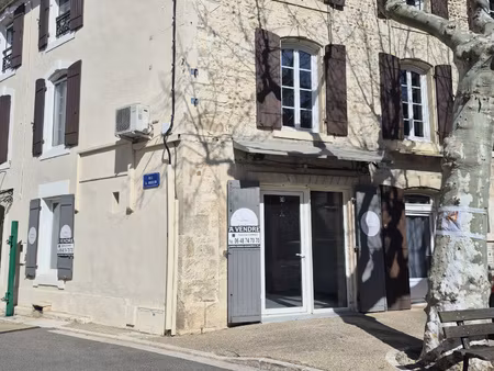 eyragues (13630) - immeuble avec appartements + local commer