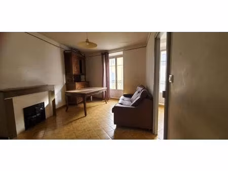 appartement de caractère immeuble 1900 en plein c?ur de ville