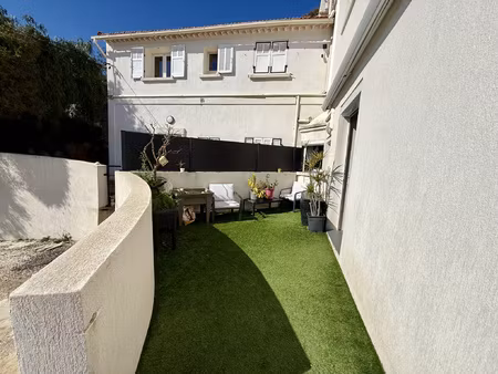 bas de villa 70m2 + 15m2 avec jardin amenage de 850m2
