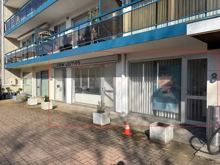 handelspand met 4 parkings en gesloten garagebox.
