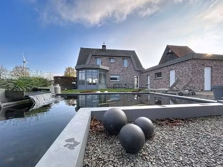 ruime woning met bijbouw en weide op perceel van 6790 m²