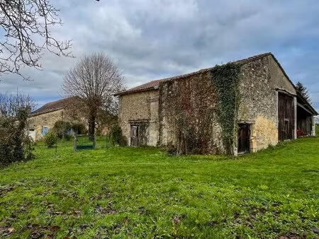 grange de 110m² avec terrain constructible de 2115m²