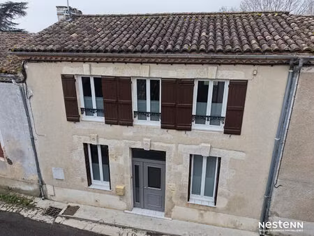 a vendre maison en pierre rénovée de 86 m² avec jardin et dépendances au coeur de mézin