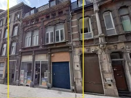 immeuble mixte comprenant : rez-commercial + 2 appartements