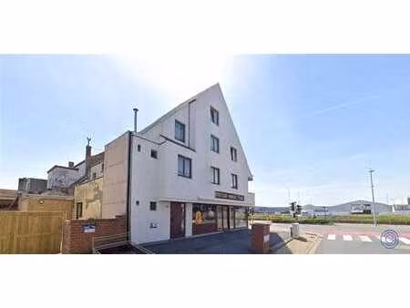 verhuurd handelshuis op centrale ligging!