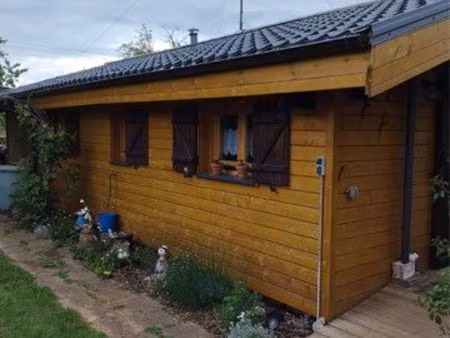 joli chalet sur terrain arboré