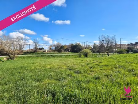 joli terrain diffus de 1360 m² proche centre village.