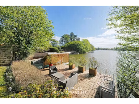 maison coup de coeur au bord d'un lac avec dépendance