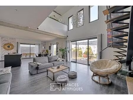 une villa en face à face avec la nature  à juvignac