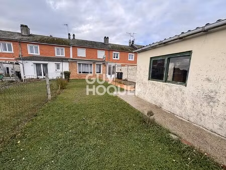 maison d'environ 90m² avec jardin et garage