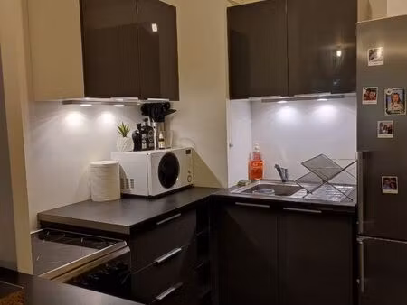 f2 avec jardin et parking a côté de la gare