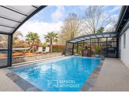 maison contemporaine avec extension jardin paysagé et piscine