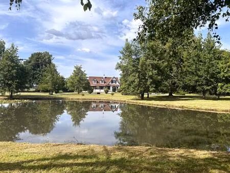 propriété avec plan d'eau - habitable de plain-pied - véranda lumineuse - au calme