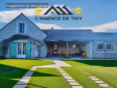 maison familiale de 184 m2 habitable avec un étang .