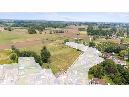 bouwgrond met gezinstuin en aanpalend grasland op 7.640m²