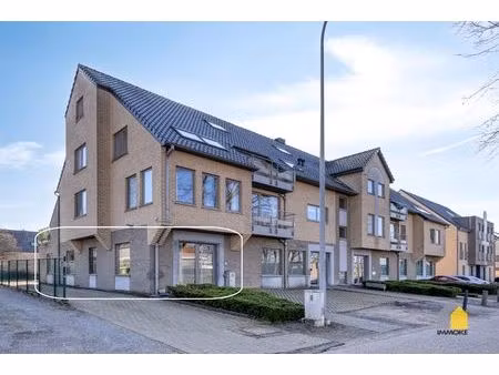 gelijkvloers appartement (91 m²) in centrum met 1 slpk en parking.