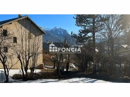 appartement t4 de 126m2 avec un jardin  en plein centre de briançon