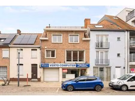immeuble commercial avec logement  garage et terrasse