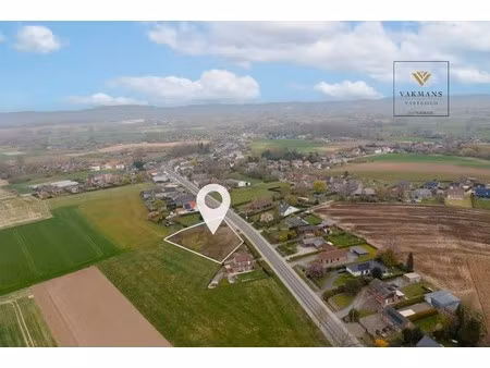 bouwgrond met verzichten en zuidgericht