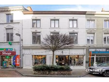 bien commercial centre de tienen – ±7% rendement & potentiel