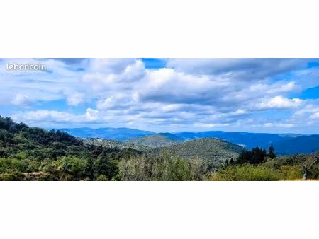 terrain 1 750 m² – vue dominante exceptionnelle – permis purgé – 89 500